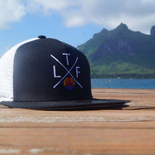 TLF Trucker Hat — Crossed Embroidered Snapback
